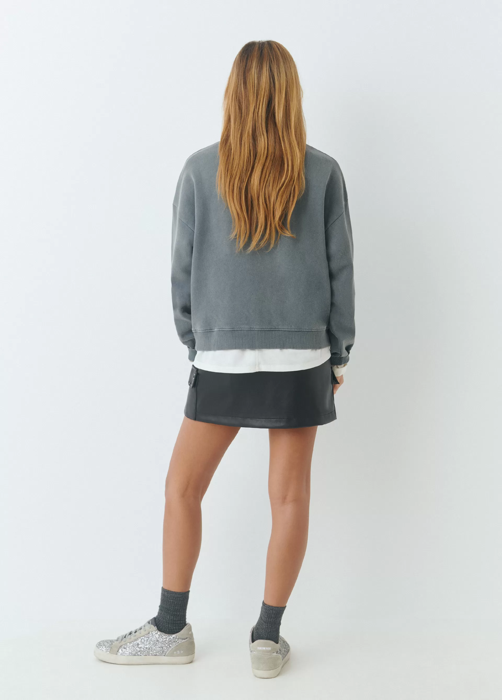 falda_mini_efecto_piel_tachas_3.webp Brownie Falda mini efecto piel tachas